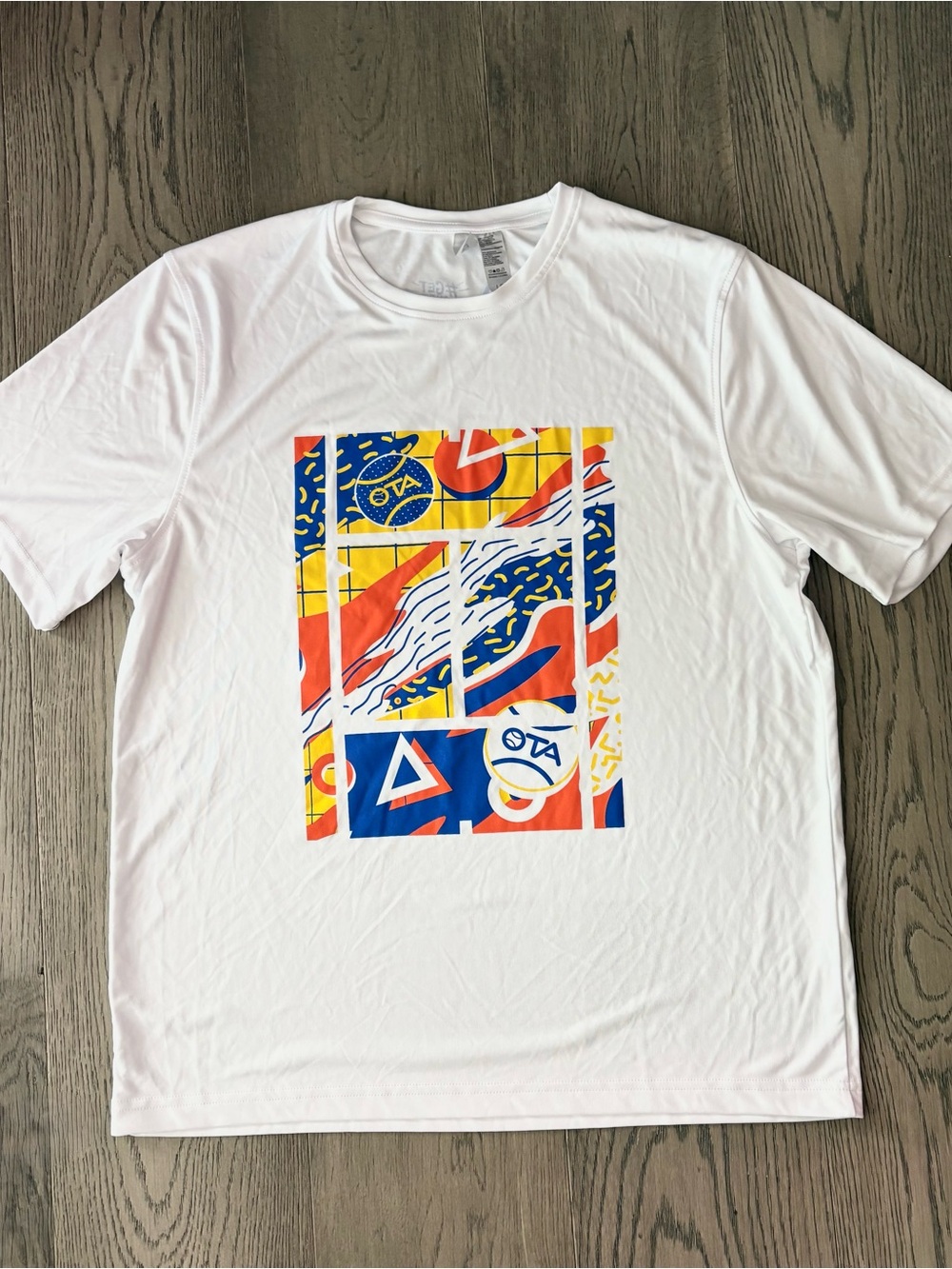 NWOT White Graphic Activewear Workout T-Shirt with Color Block Print
